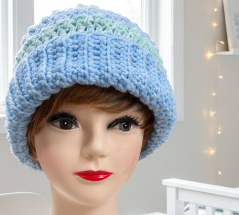 Handmade crocheted beanie/hat in light blue & green.