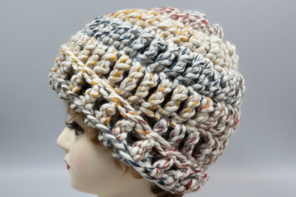 Handmade crocheted beanie in shades of grey, orange & beige