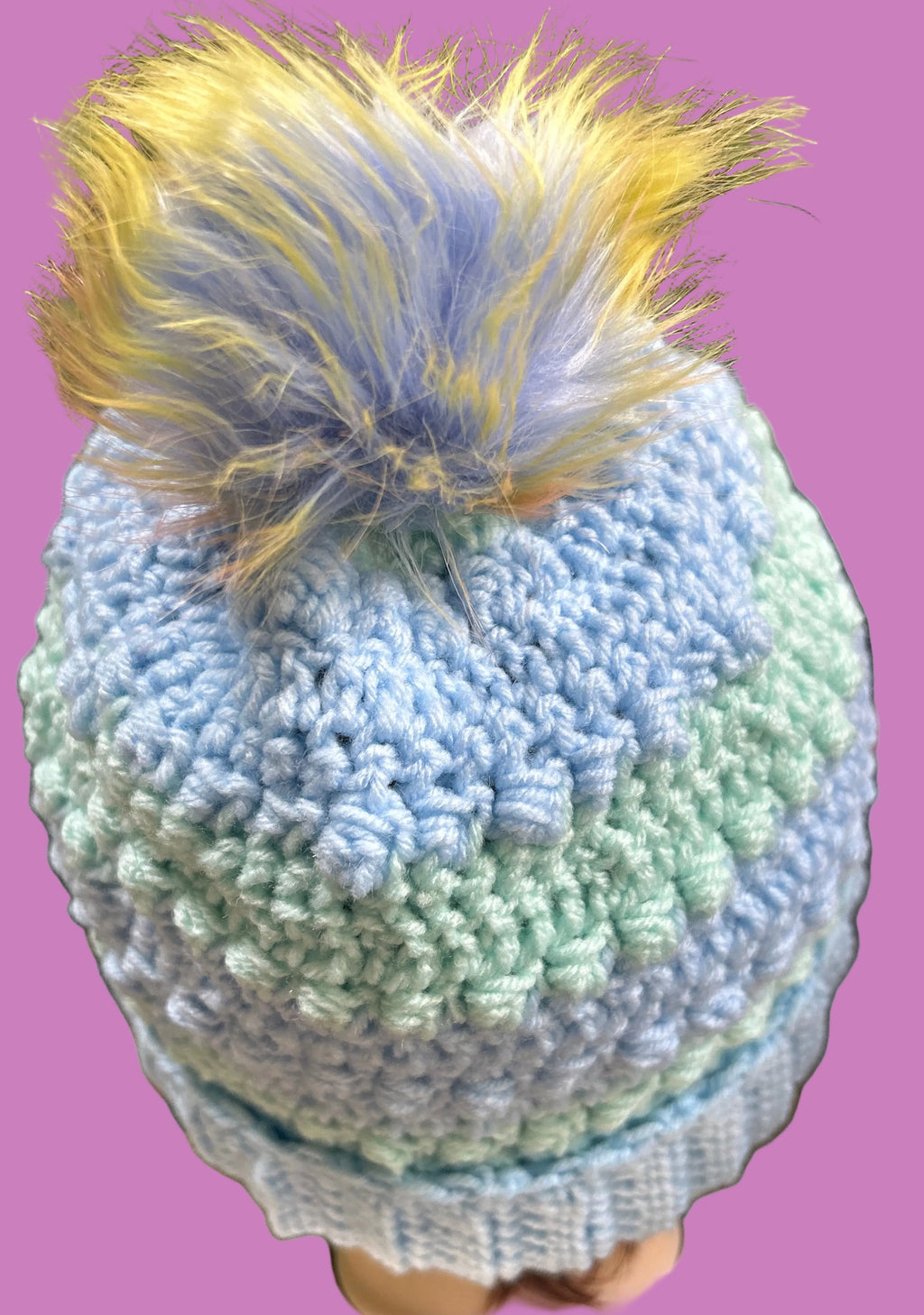 Handmade crocheted beanie/hat in light blue & green.