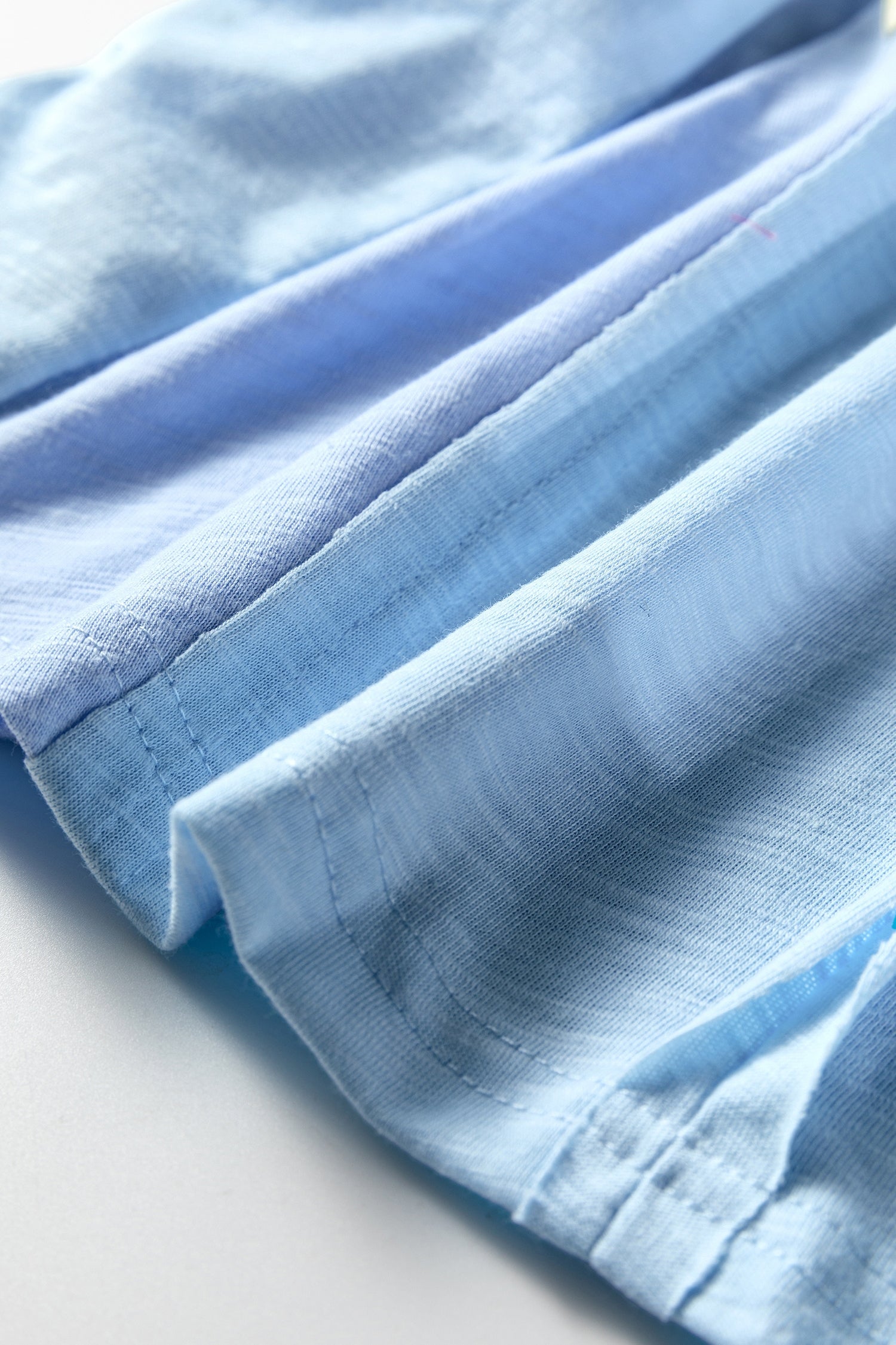 Light Blue Flower Patched Exposed Seam Bracelet Sleeve Oversized T Shirt