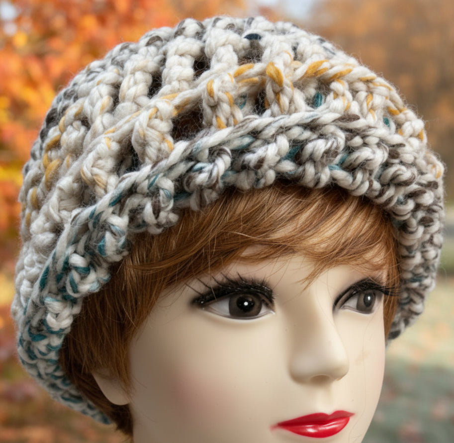 Handmade crocheted beanie in shades of grey, orange & beige