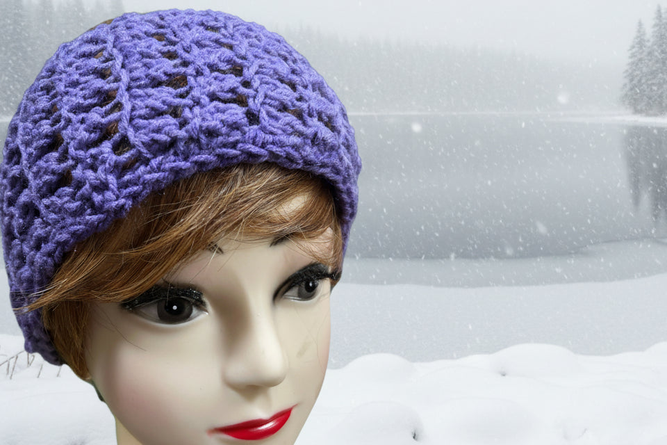 Purple handmade crocheted headband.