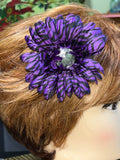 Multicolored zebra floral hair clips.