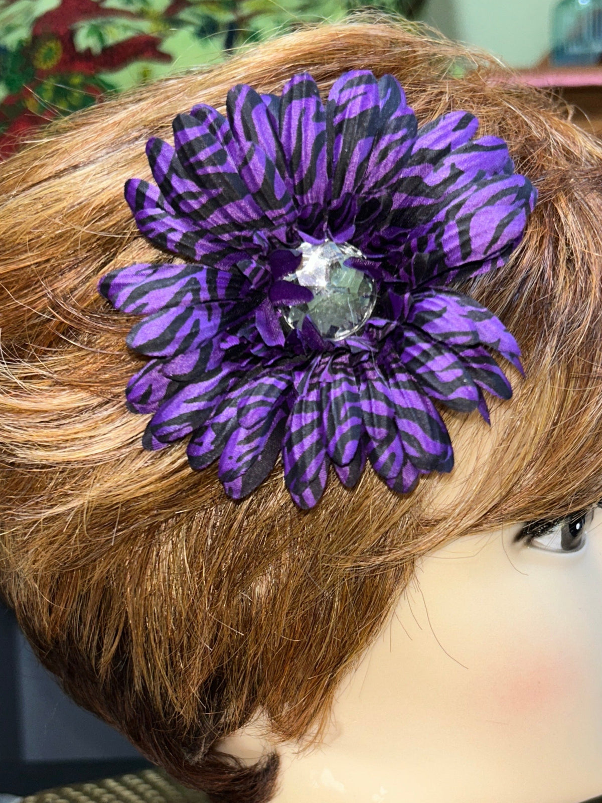 Multicolored zebra floral hair clips.
