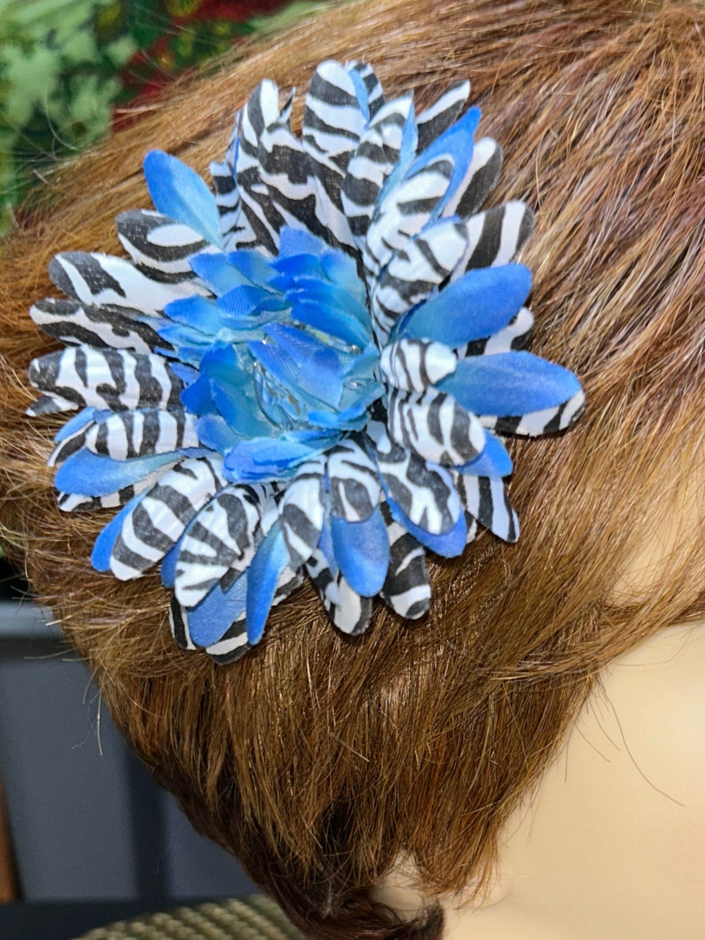 Multicolored zebra floral hair clips.