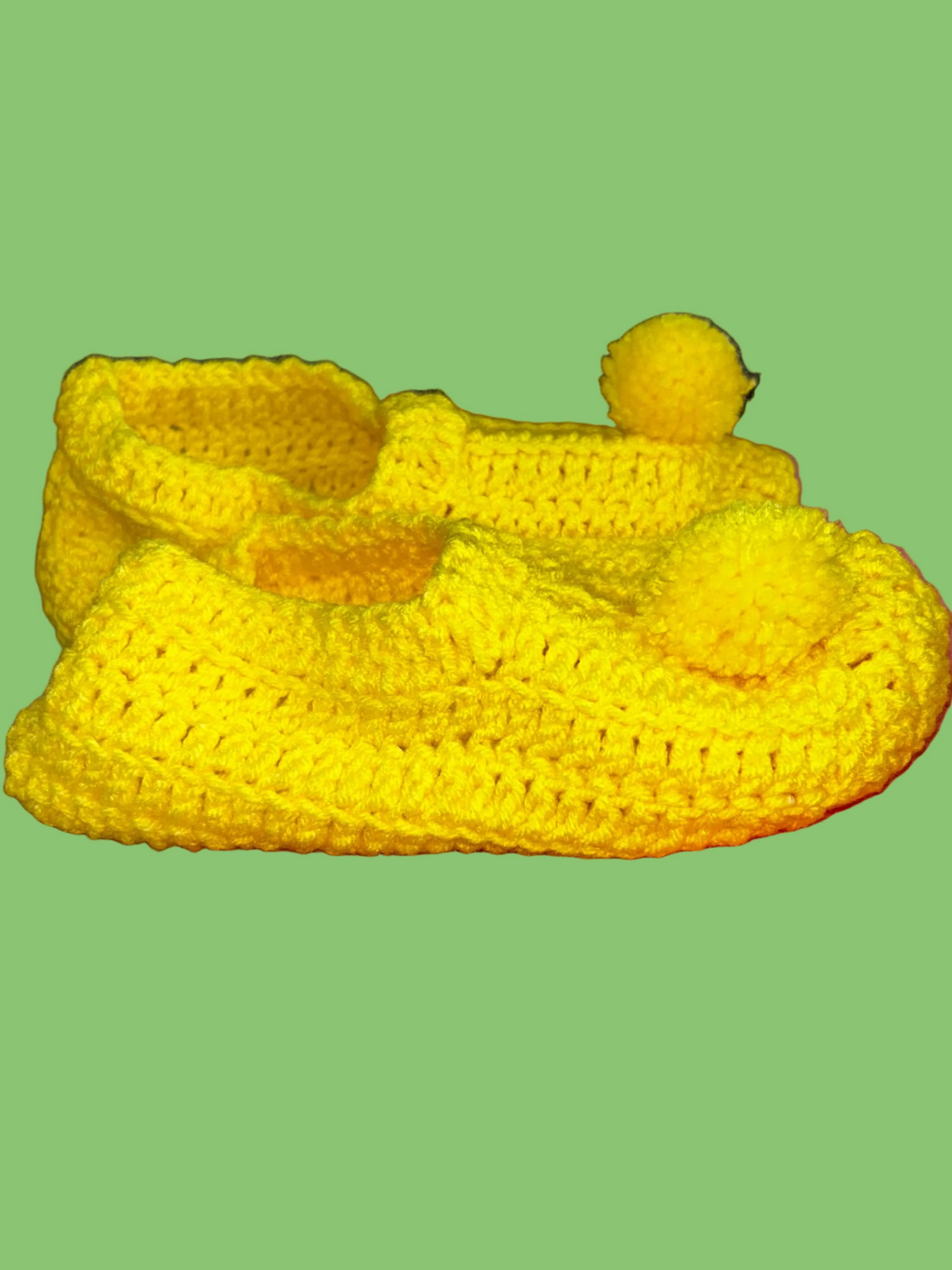A Pair of Yellow Handmade Crocheted Booties  Medium