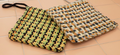 2 Woven Handmade Potholders or Hot mats in Yellow, Black & Orange