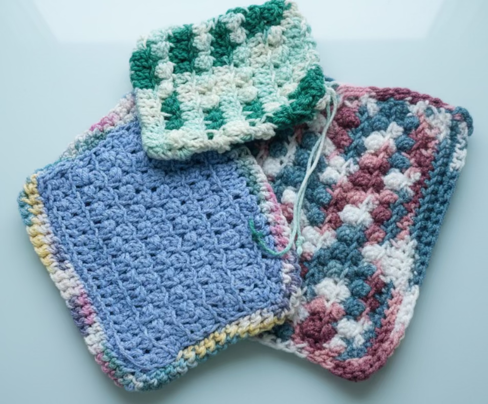 2 handmade crocheted washcloths with drawstring bag for soap.