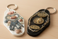 A pair of decorated retro motel key chains.