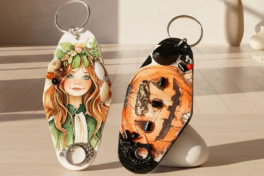 A pair of decorated retro motel key chains.