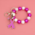 Pearl Wristlet Keychain with Gold Pink Ribbon Accent – Stylish Accessory