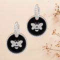 Silver Twisted Hoops with Black Bee Charm – Stylish Statement Earrings