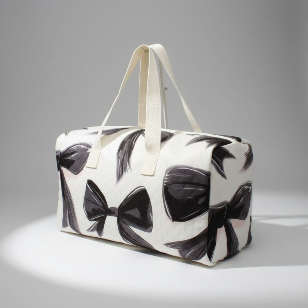 Fashion Travel Duffel Bag Cream Quilted with Black Bow Stylish and Chic