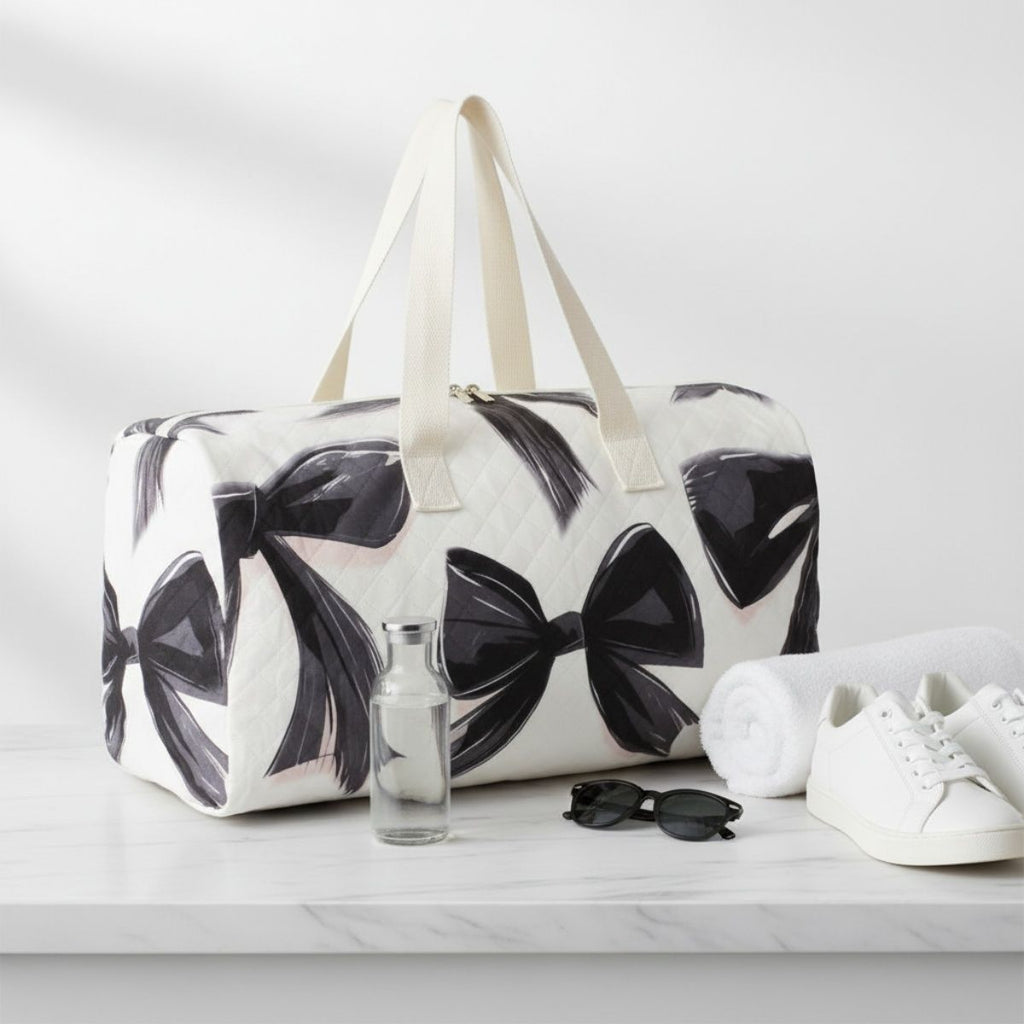Fashion Travel Duffel Bag Cream Quilted with Black Bow Stylish and Chic