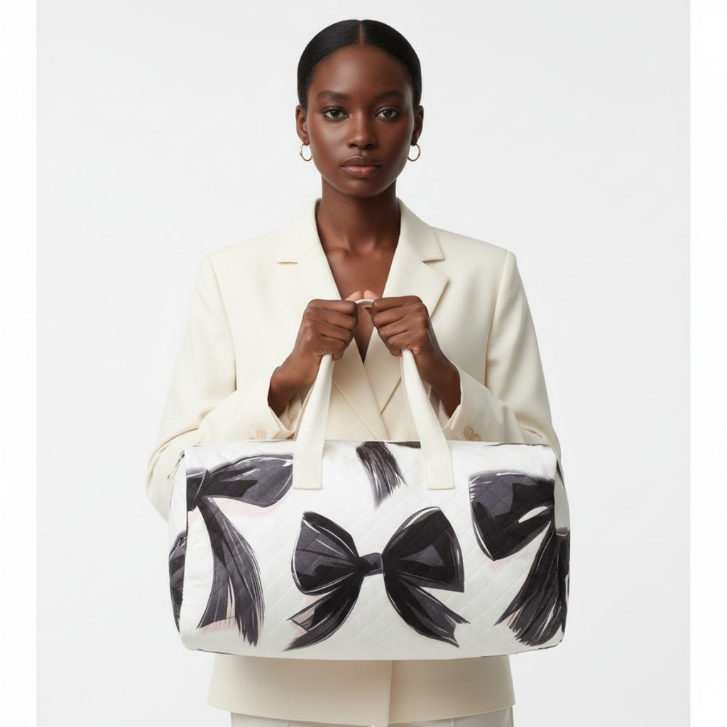 Fashion Travel Duffel Bag Cream Quilted with Black Bow Stylish and Chic