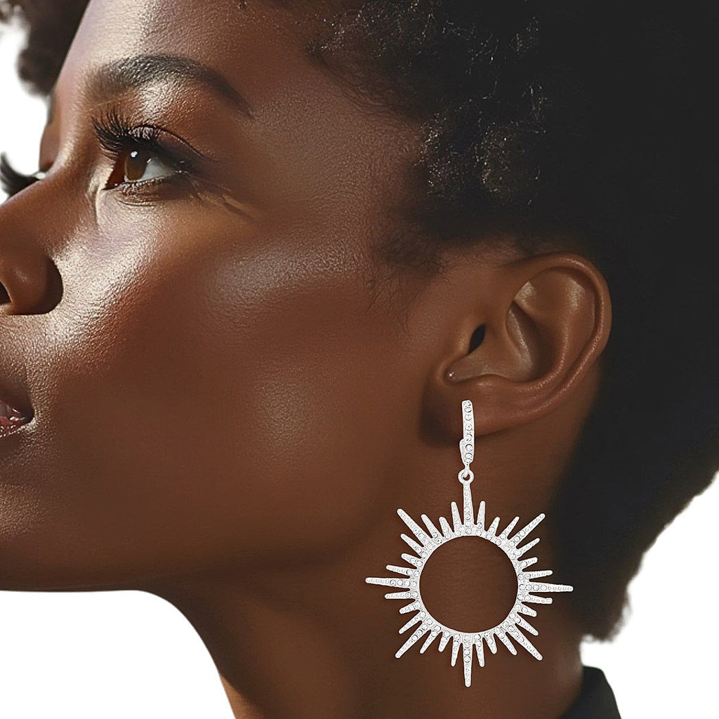 Silver Drop Hoop Earrings with Sunburst Rhinestone Detail – Stylish Statement Jewelry