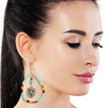 Statement Longhorn Earrings with Turquoise Bead Teardrop Design